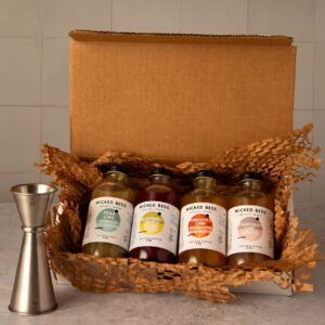 Wicked Bess 4 pack variety bundle — four 4oz artisan shrub bottles, one of each flavor, in a gift box