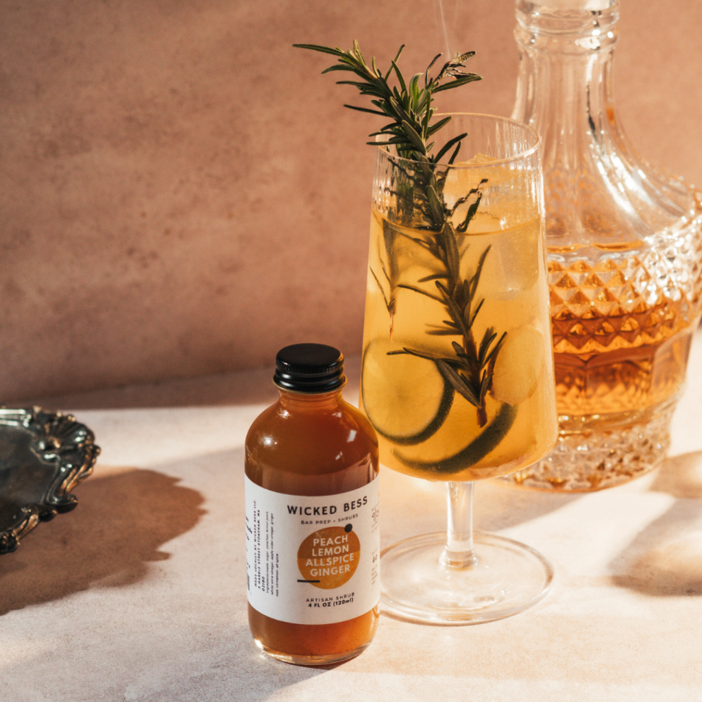 Ride, Sybil, Ride cocktail with a bottle of Wicked Bess shrub